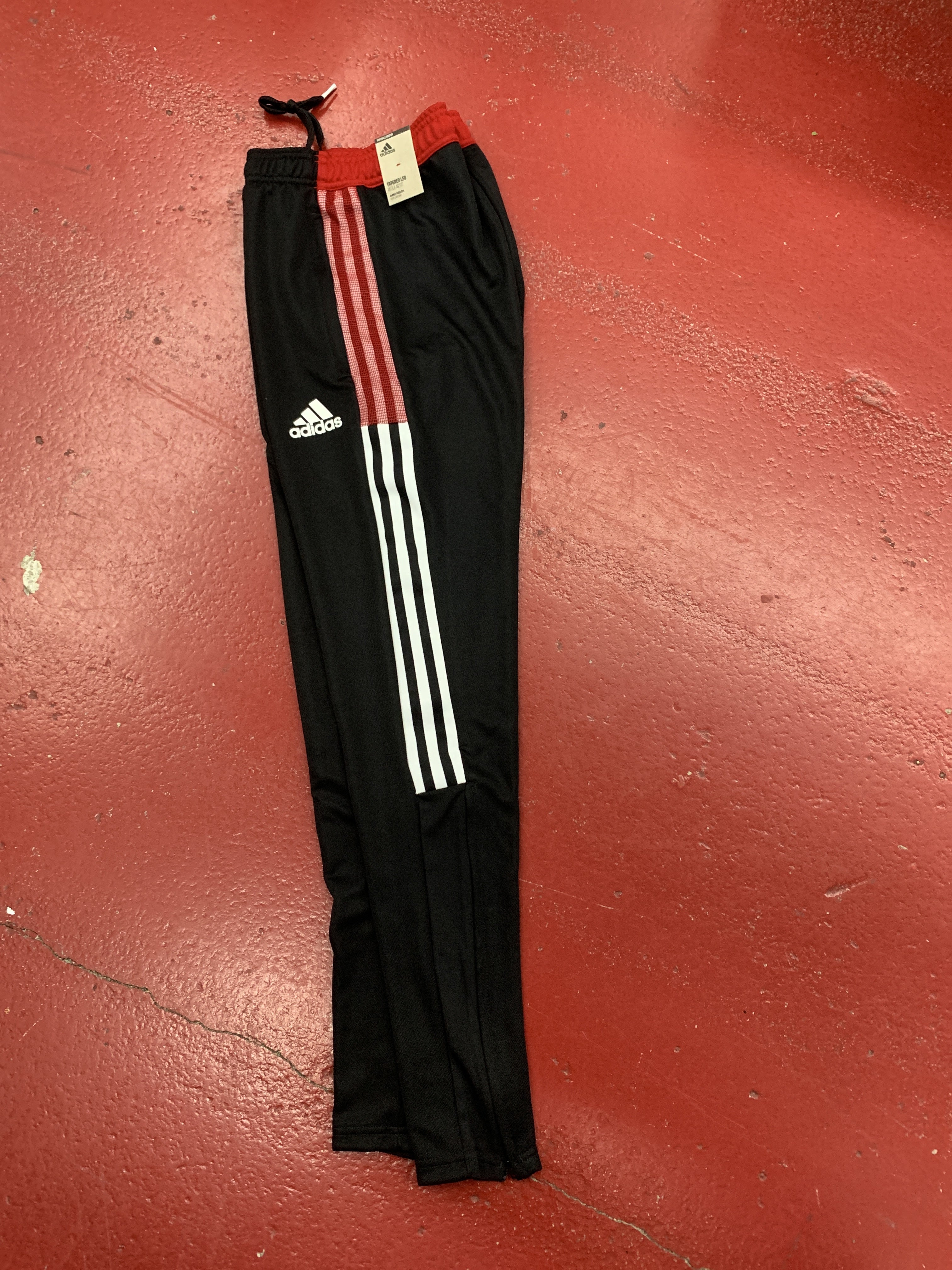 Orange and hotsell black adidas pants